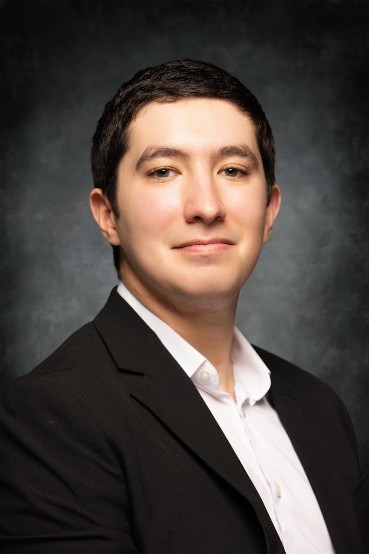 headshot of marc alaniz